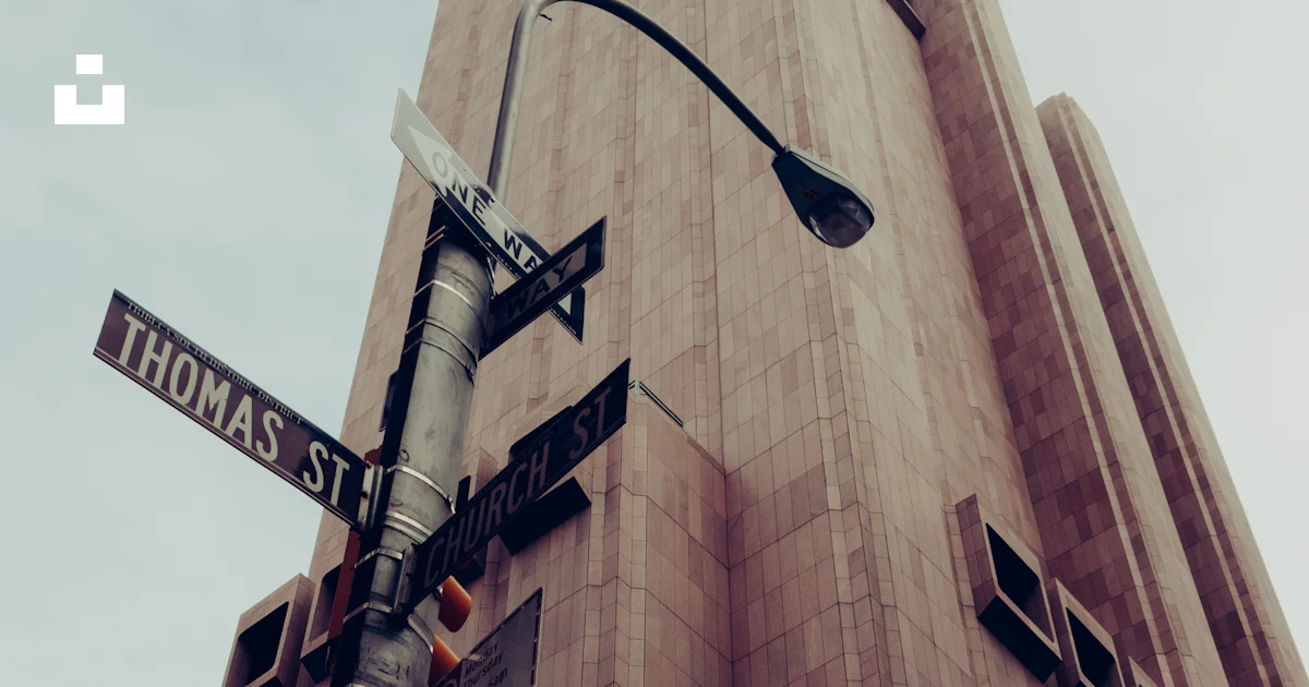 Thomas R Sign Low-angle photography of Thomas St. sign photo – Free 33 thomas street ...