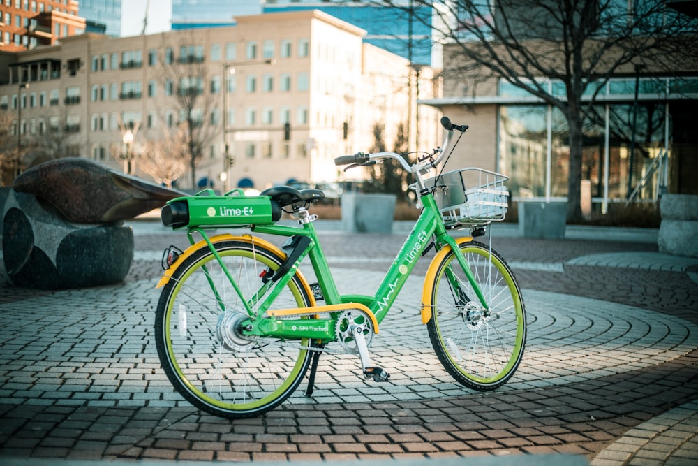 green city bike on pavement