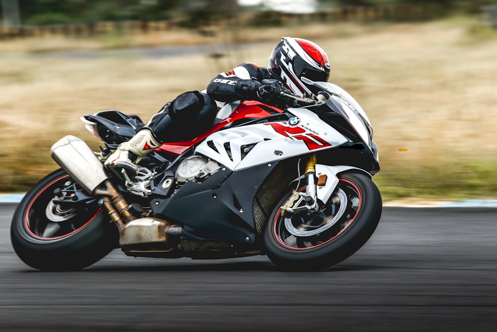 man riding sports bike