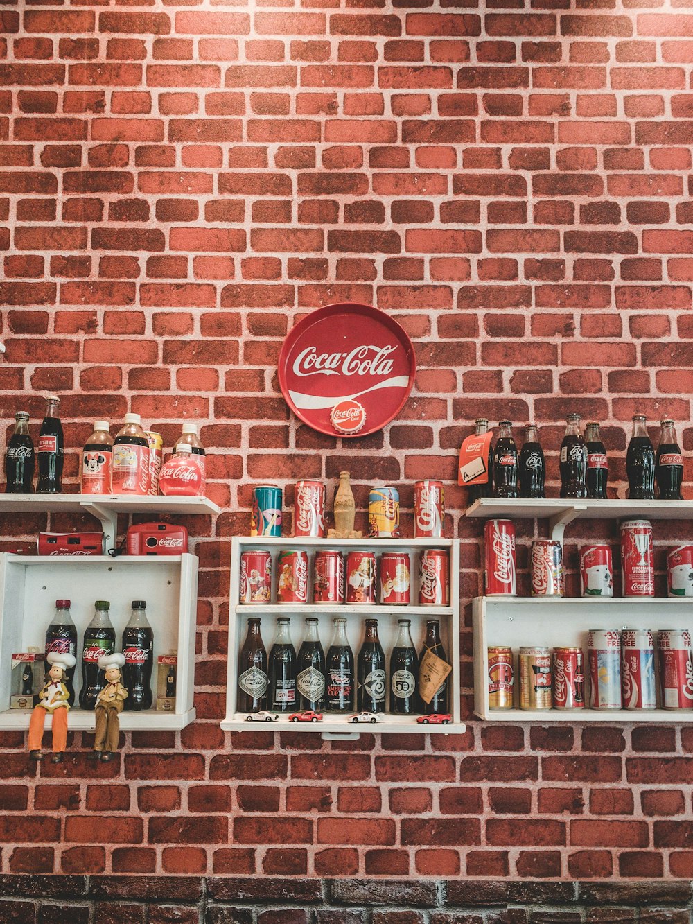 assorted design of Coca-Cola soda lot on display