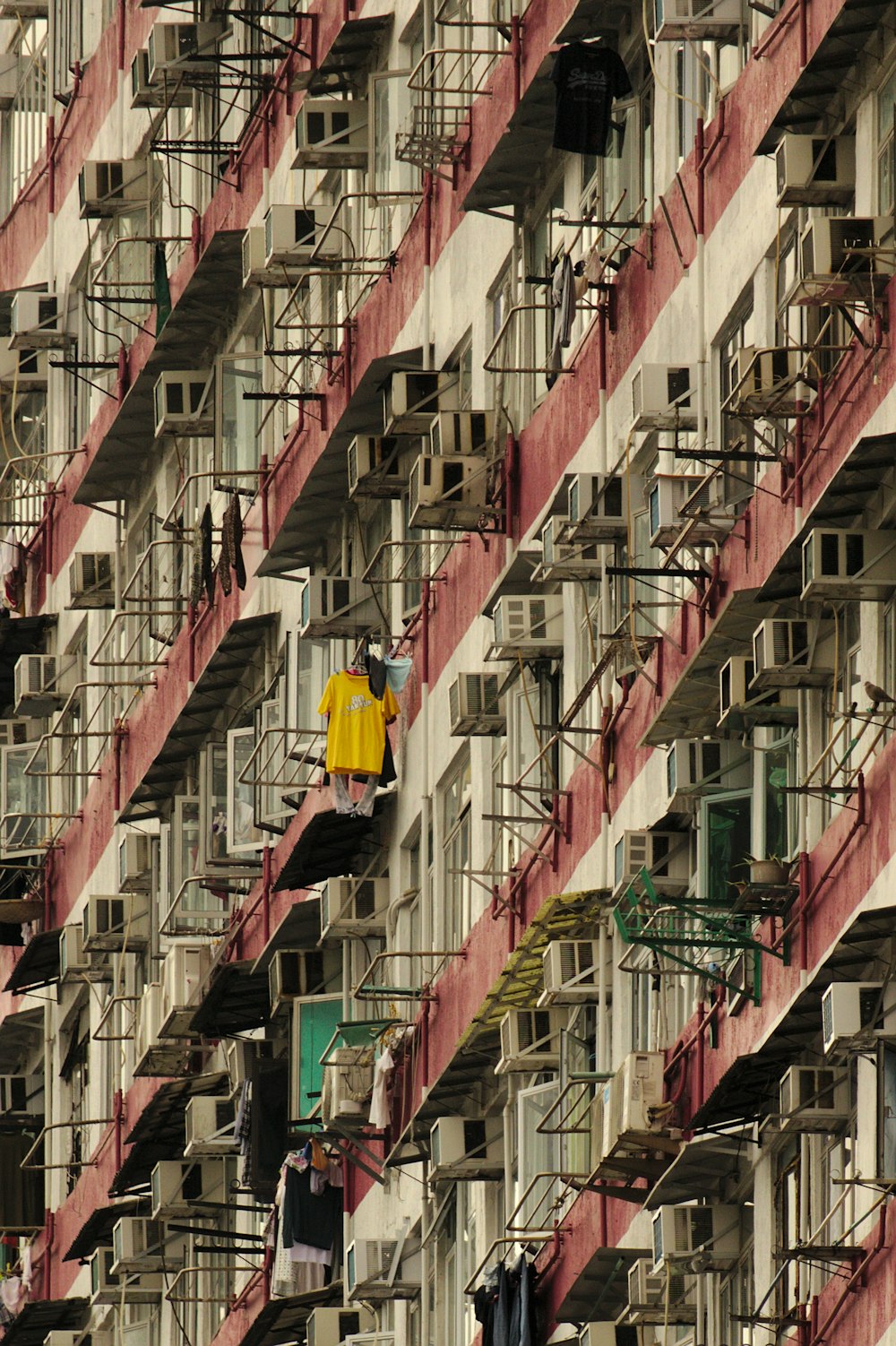 white and red high rise building