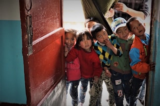 A warm and welcoming community center where children are playing and learning together.