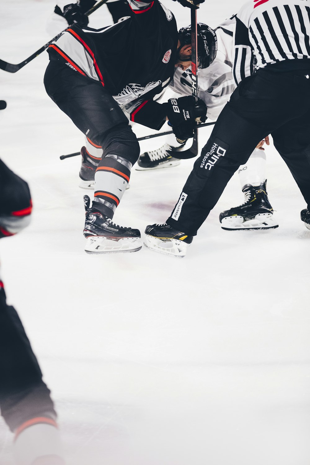 men playing hockey