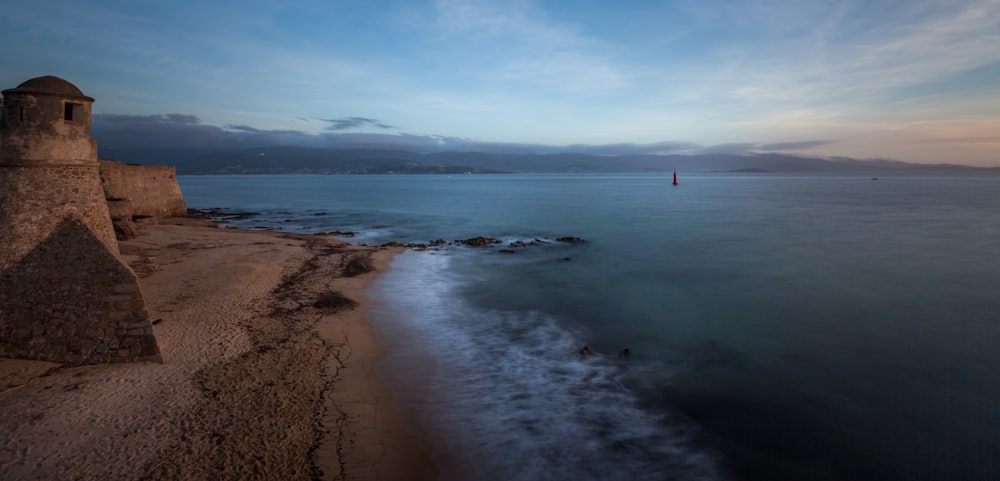 fort beside sea during daytime