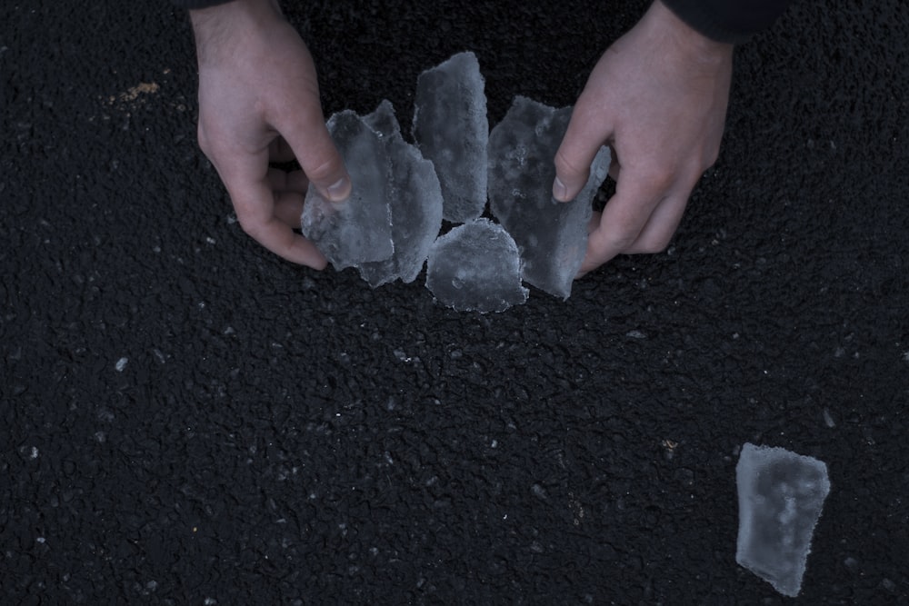 person holding ice