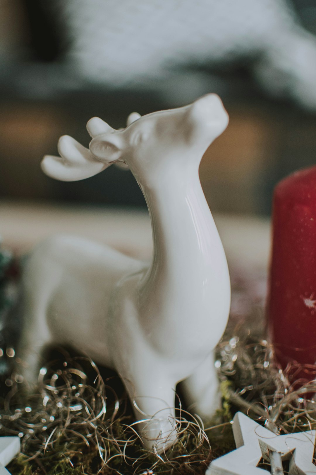 white ceramic deer figurine