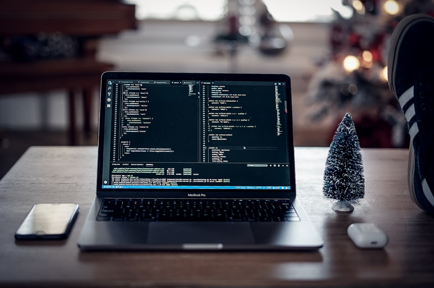 Person working on a website on a laptop with a clean workspace