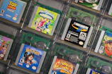 Close-up of vibrant custom-colored Game Boy Advance cartridge shells lined up.
