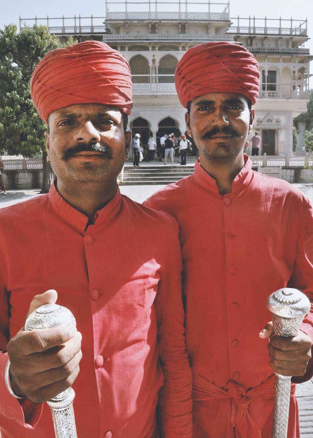 two men standing next to each other