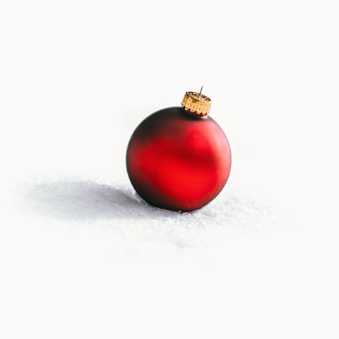 selective focus photo of red Christmas baubles
