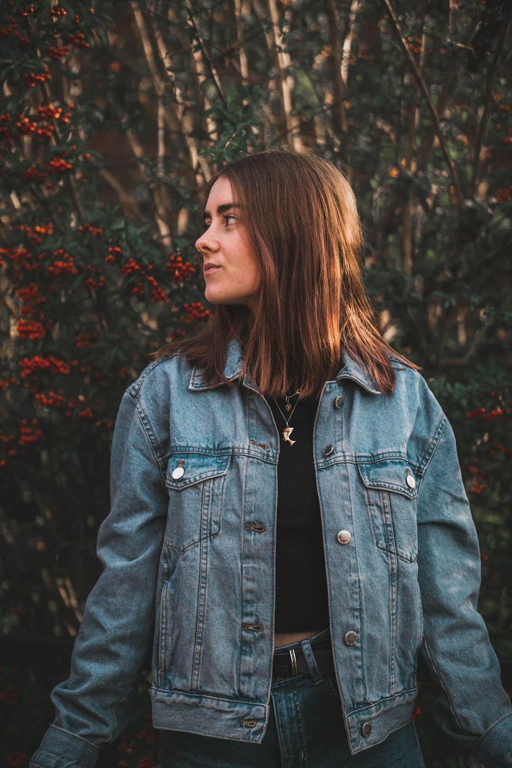 woman wearing denim jacket