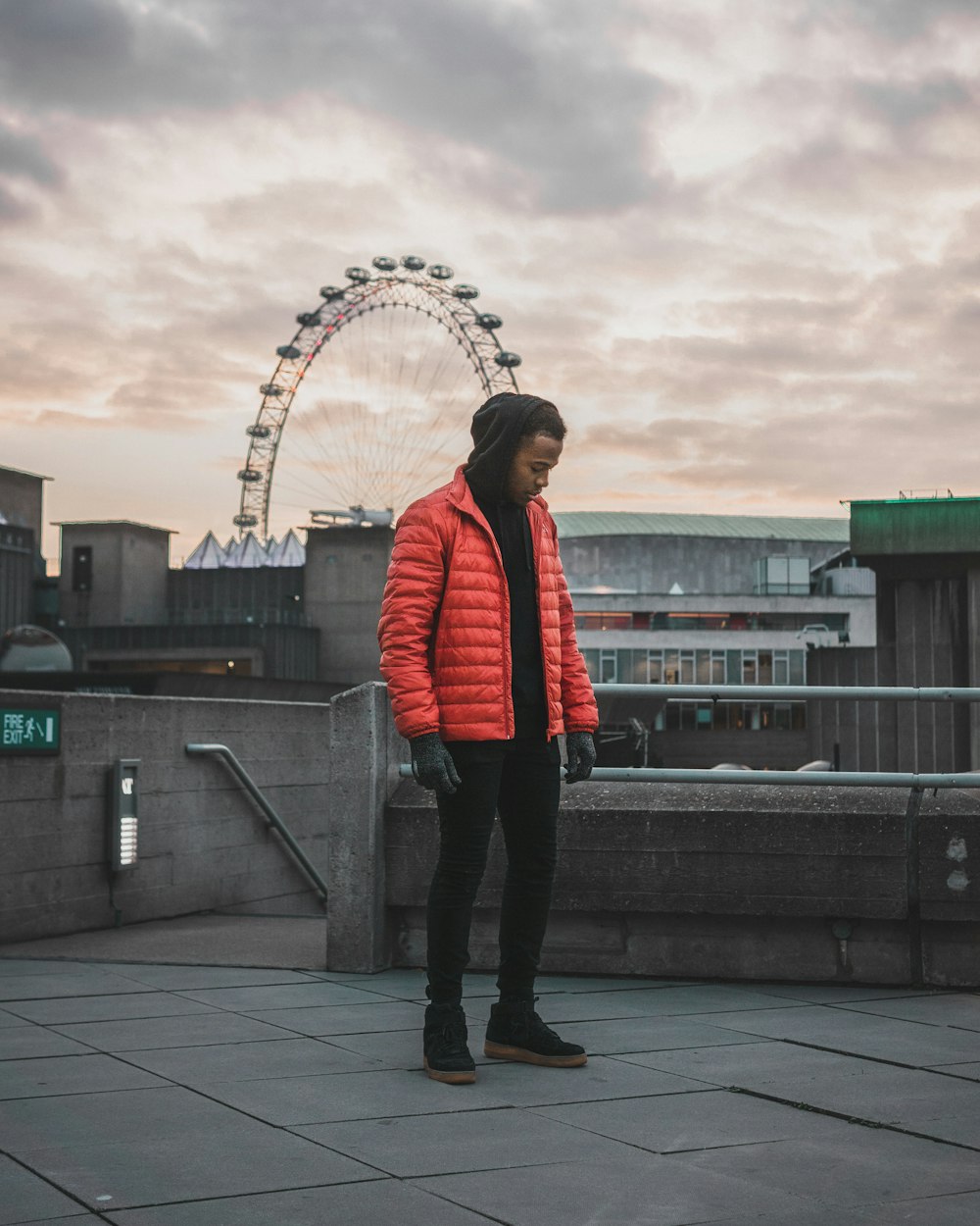 man wearing red bubble jacket