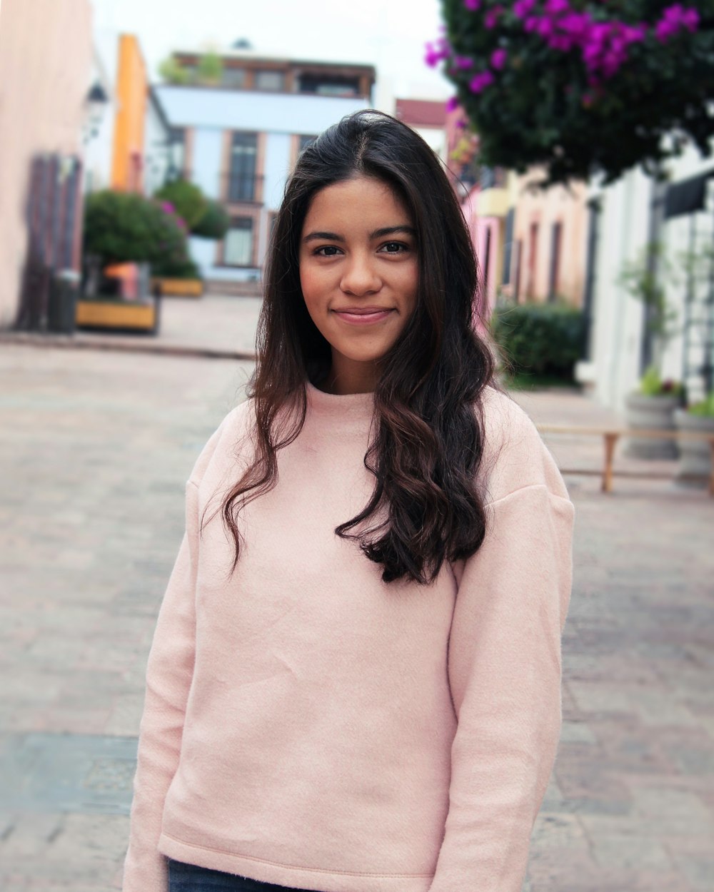 woman in pink crew-neck sweatshirt