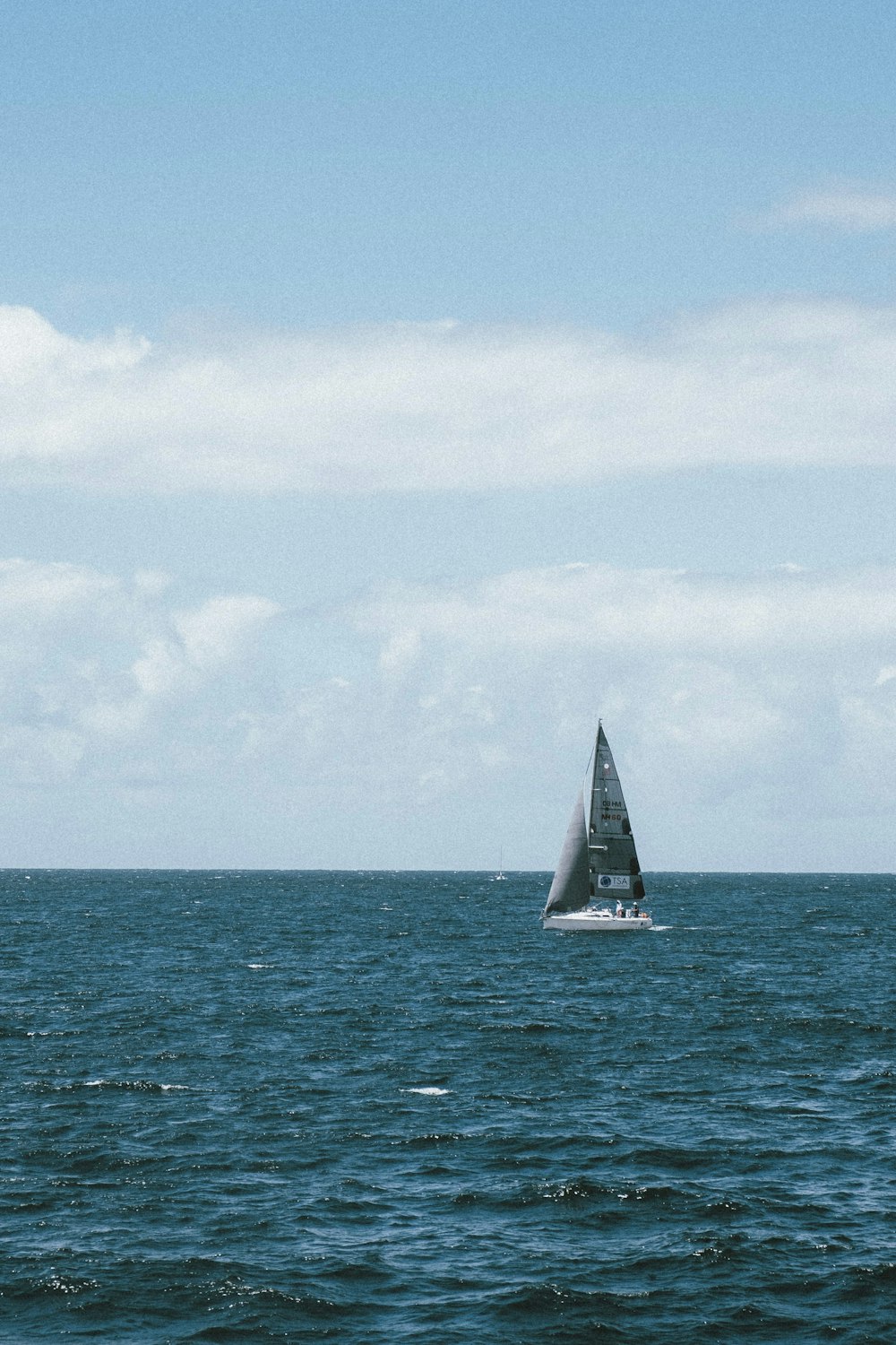 sailboat in the middle of sea