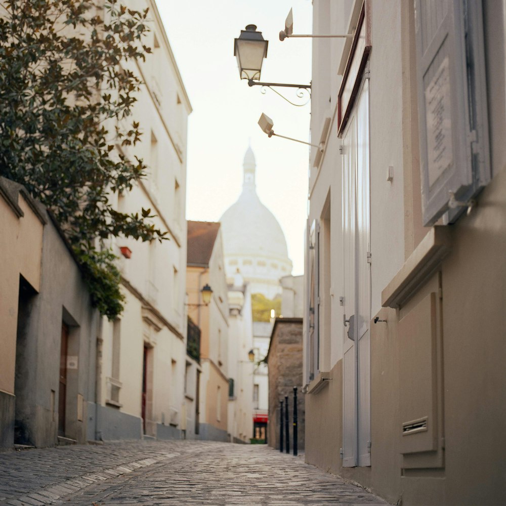 gray concrete alleyway during daytime