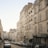A peaceful street in Paris with a warm glow.