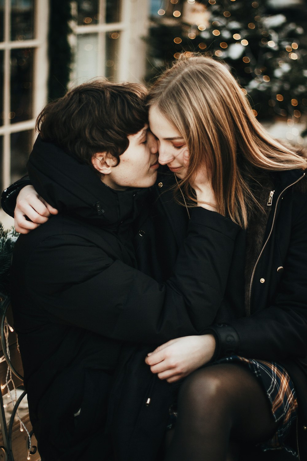 man and woman hugging each other