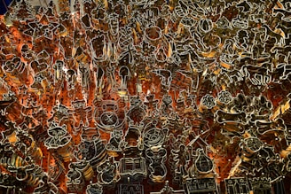 Flat cutting dies arranged neatly showcasing various shapes for corrugated cardboard and leather