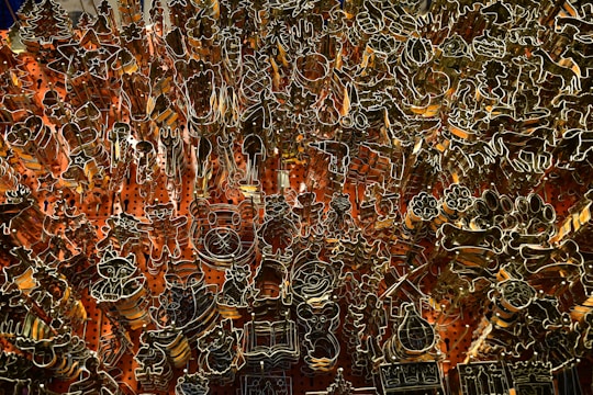 A collection of unique clay cutters displayed creatively.