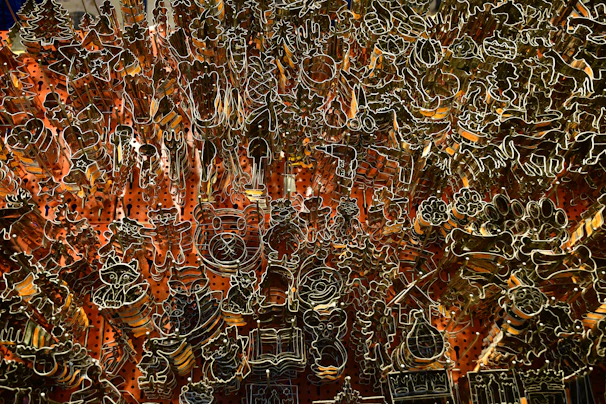 A variety of custom die-cut shapes displayed on a wooden table.