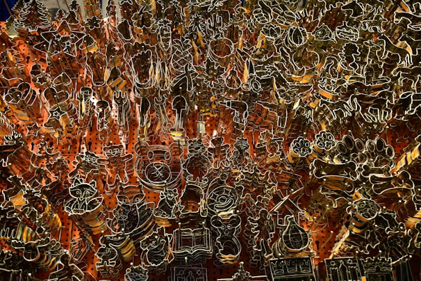 Flat cutting dies arranged neatly showcasing various shapes for corrugated cardboard and leather