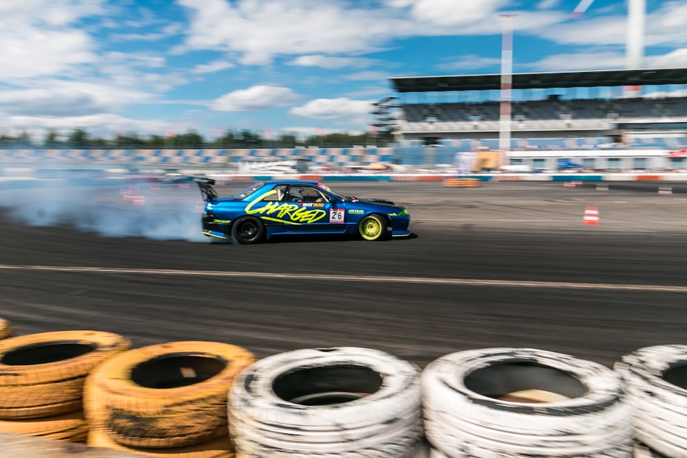 speeding car on race track during day