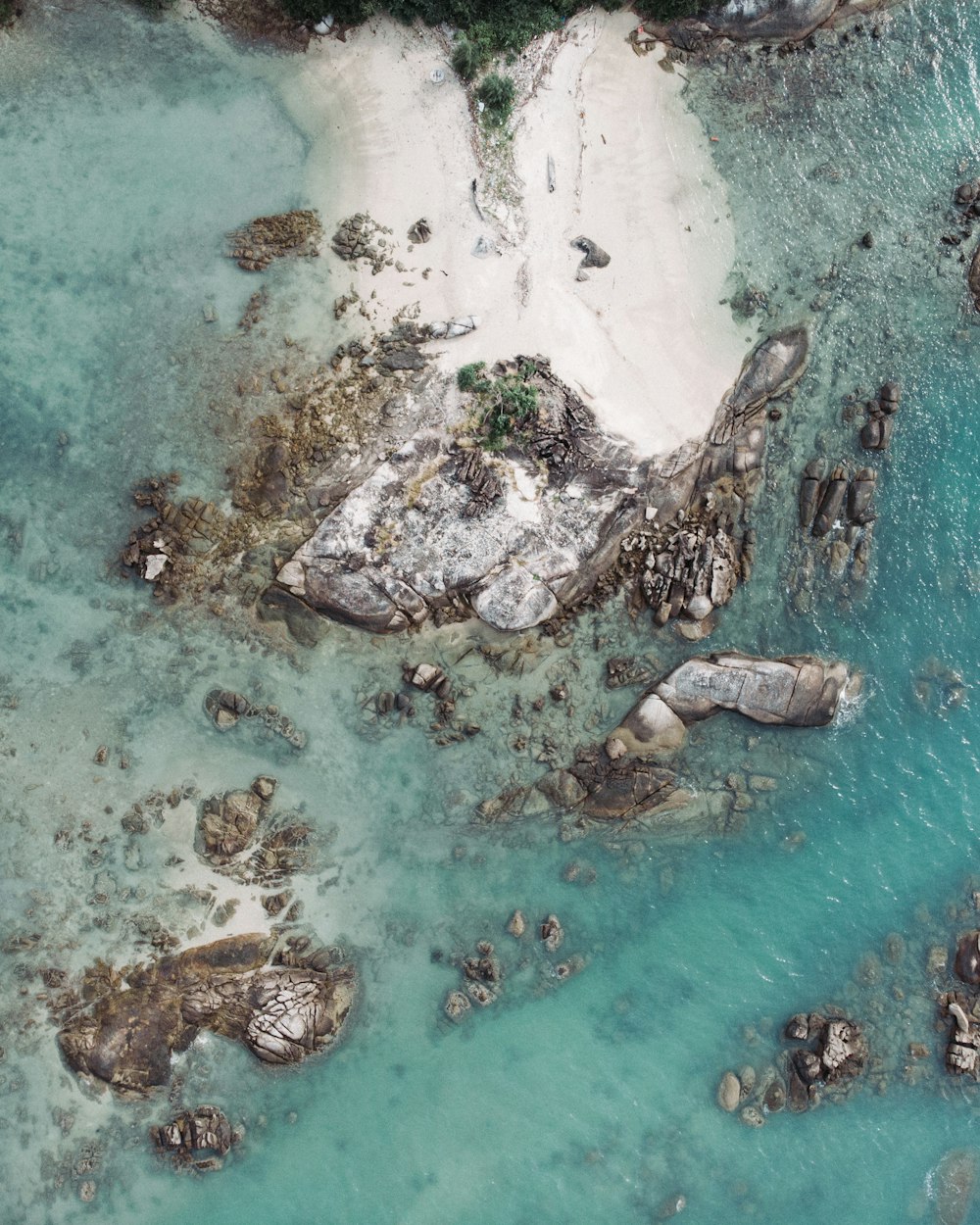 aerial photography of coastal rocks during daytime