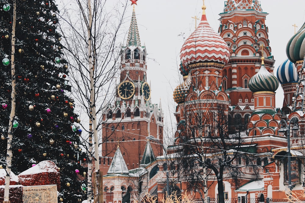 large Christmas tree near St. Basil's Cathedral during daytime