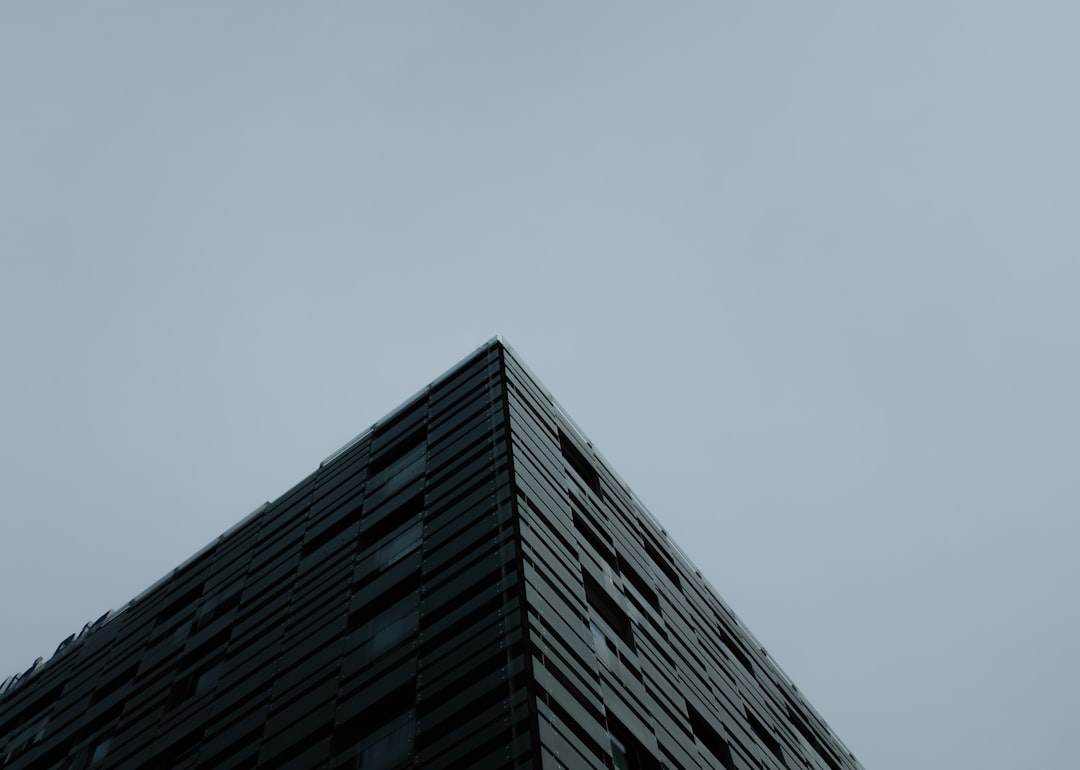 grayscale photography of high-rise building