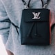 black Louis Vuitton backpack