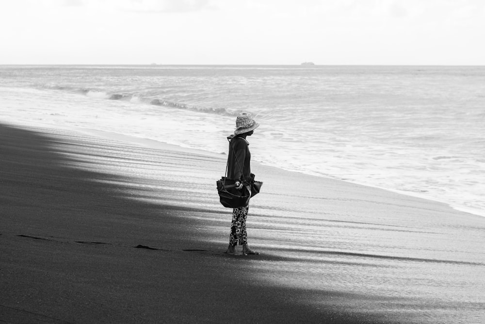 person standing on seashore