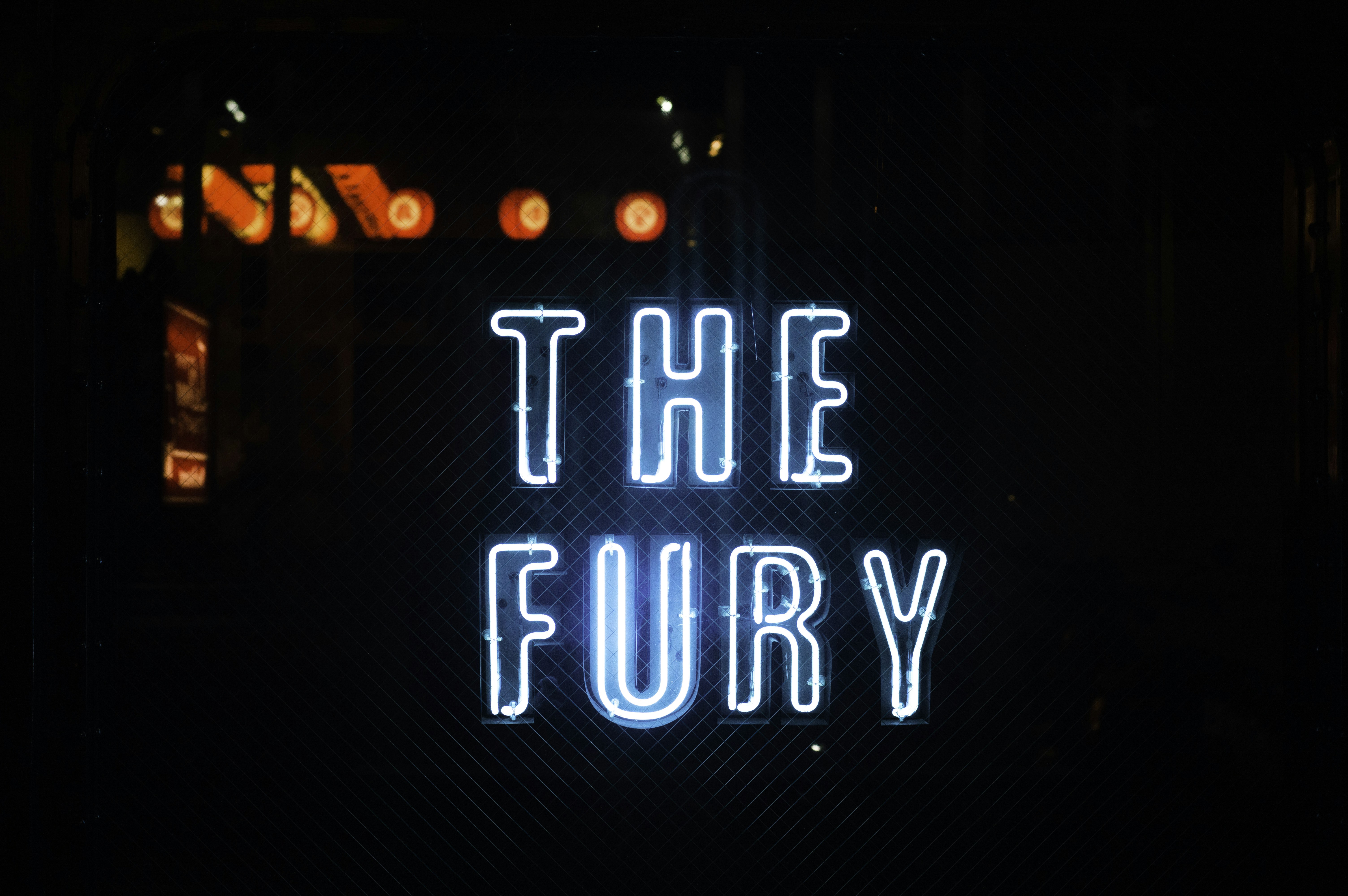 blue The Fury neon light sign (Photo by Ray ZHUANG on Unsplash)