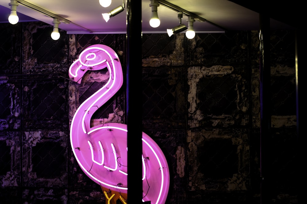 purple and white flamingo LED signage