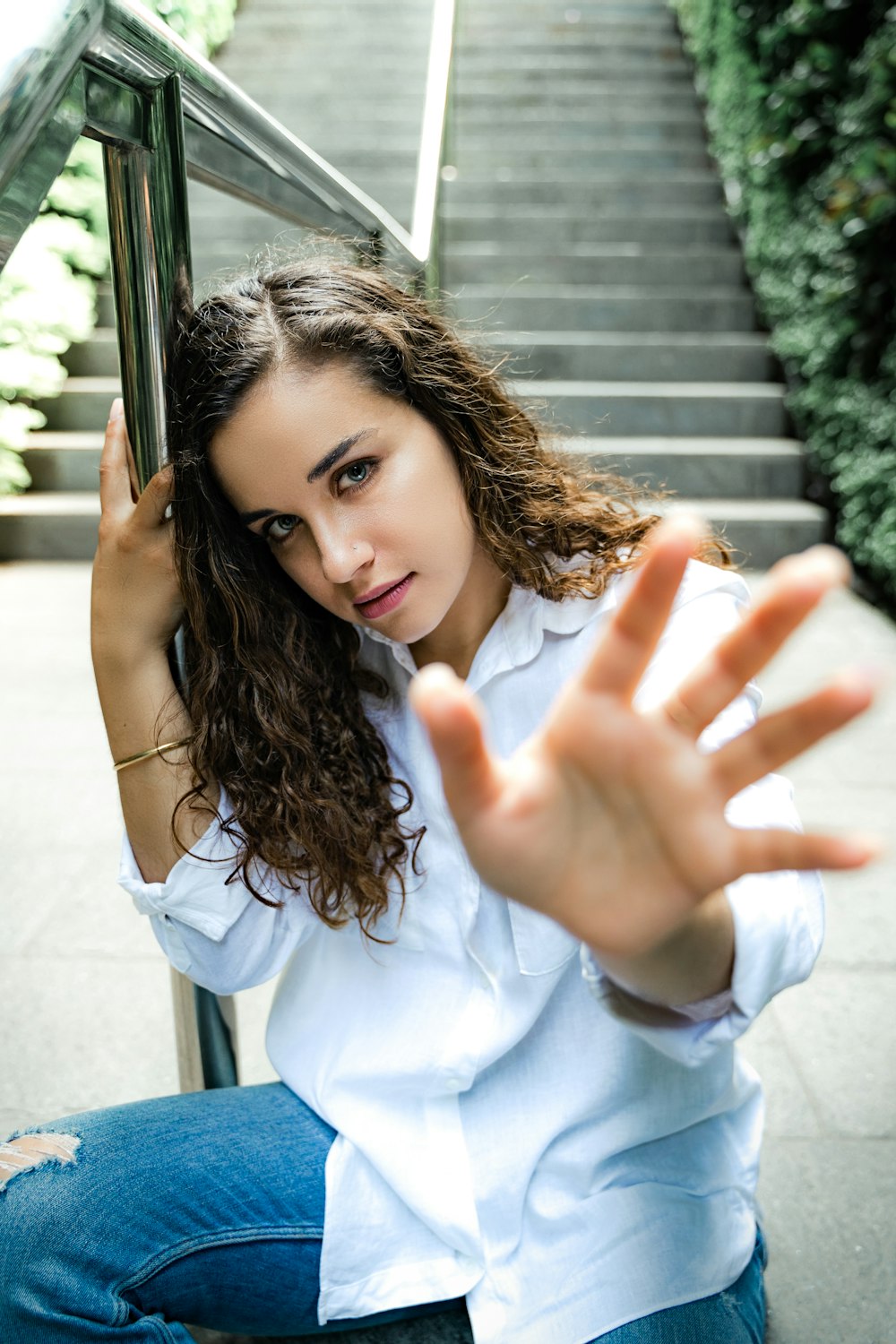 woman raising hand