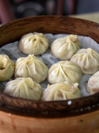 steam buns on brown container