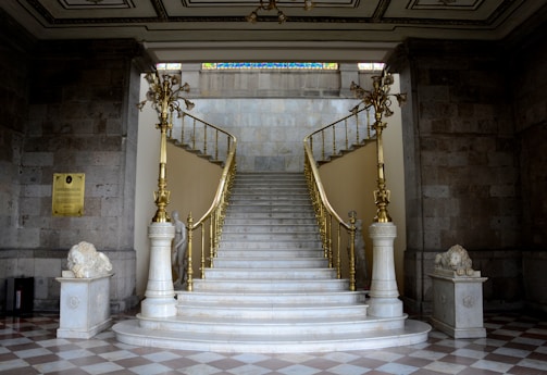 An elegant staircase featuring polished marble steps.