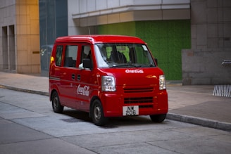 red minivan parked beside road
