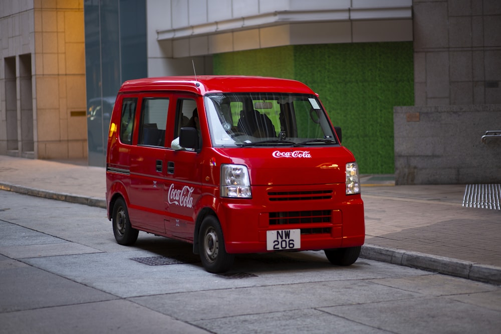 red minivan parked beside road