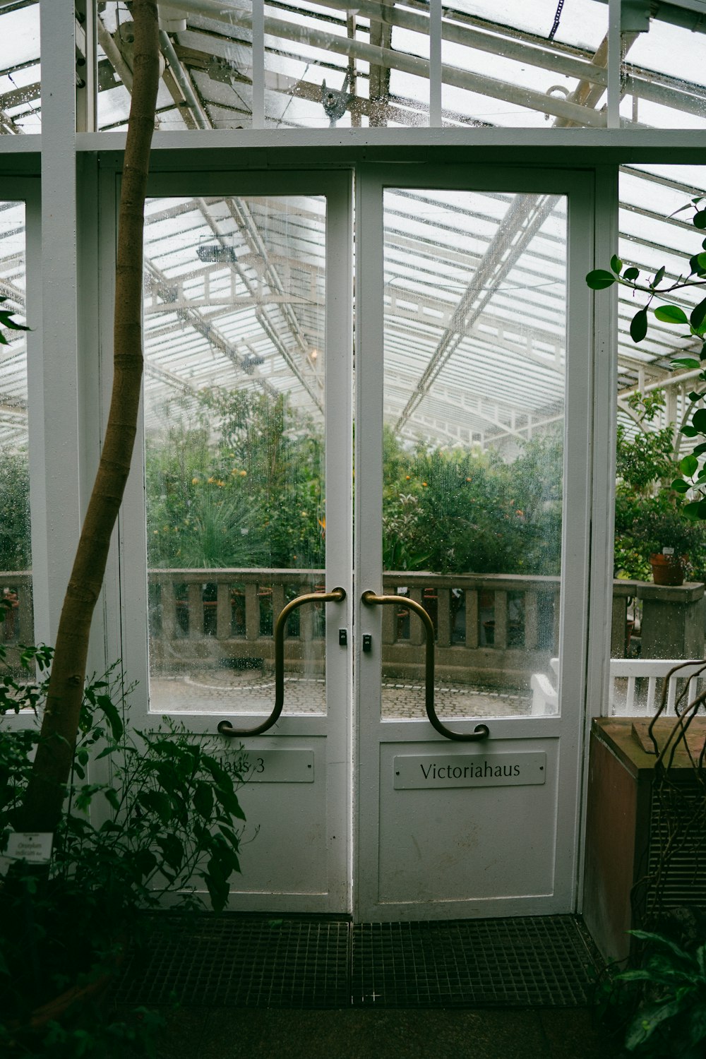 closed white wooden French door during daytime