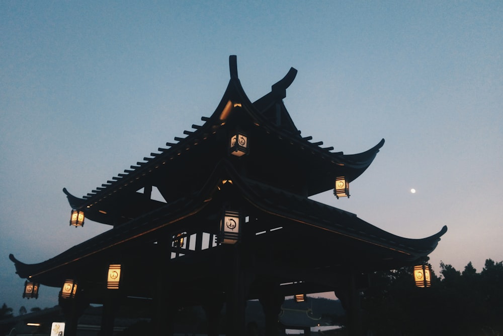 lighted temple during sunset