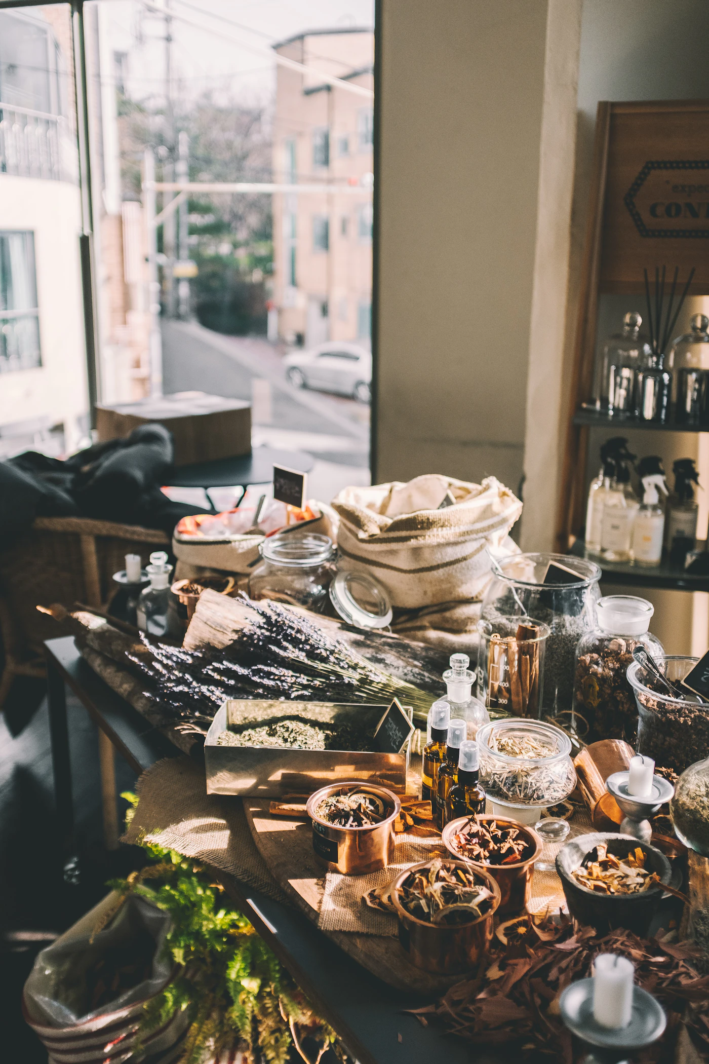 Herbs and spices arranged on a wooden worktable