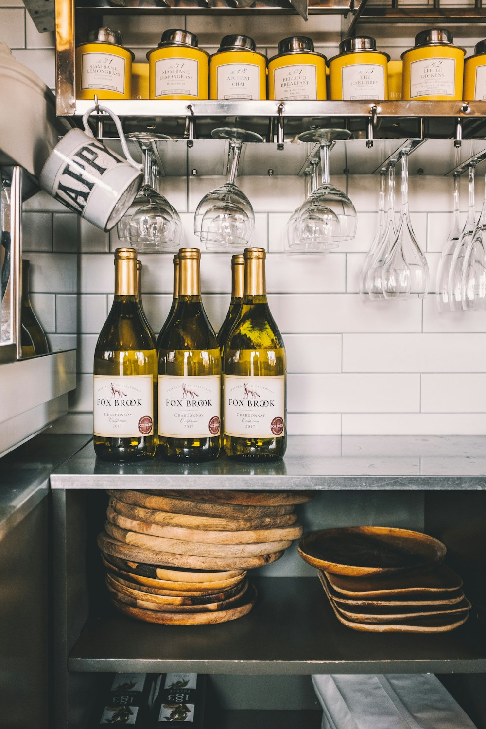 six wine bottle on top dough table