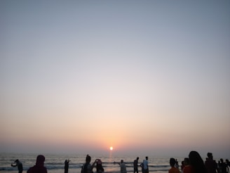A serene beach sunset captured during a peaceful getaway arranged by att