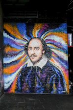 Colorful murals celebrating Afro-Colombian history and resilience in an urban neighborhood.