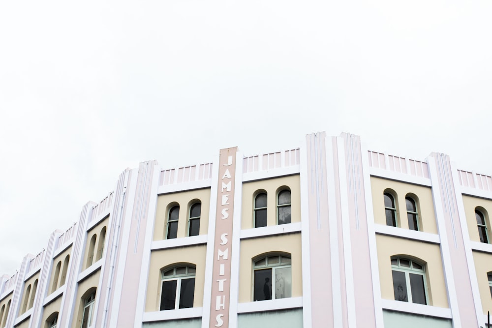 beige and pink concrete building during daytime