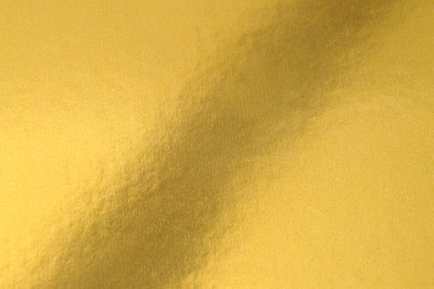 yellow and white area rug gold zoom background