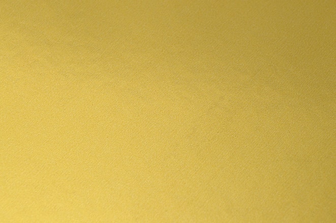 yellow textile in close up photography