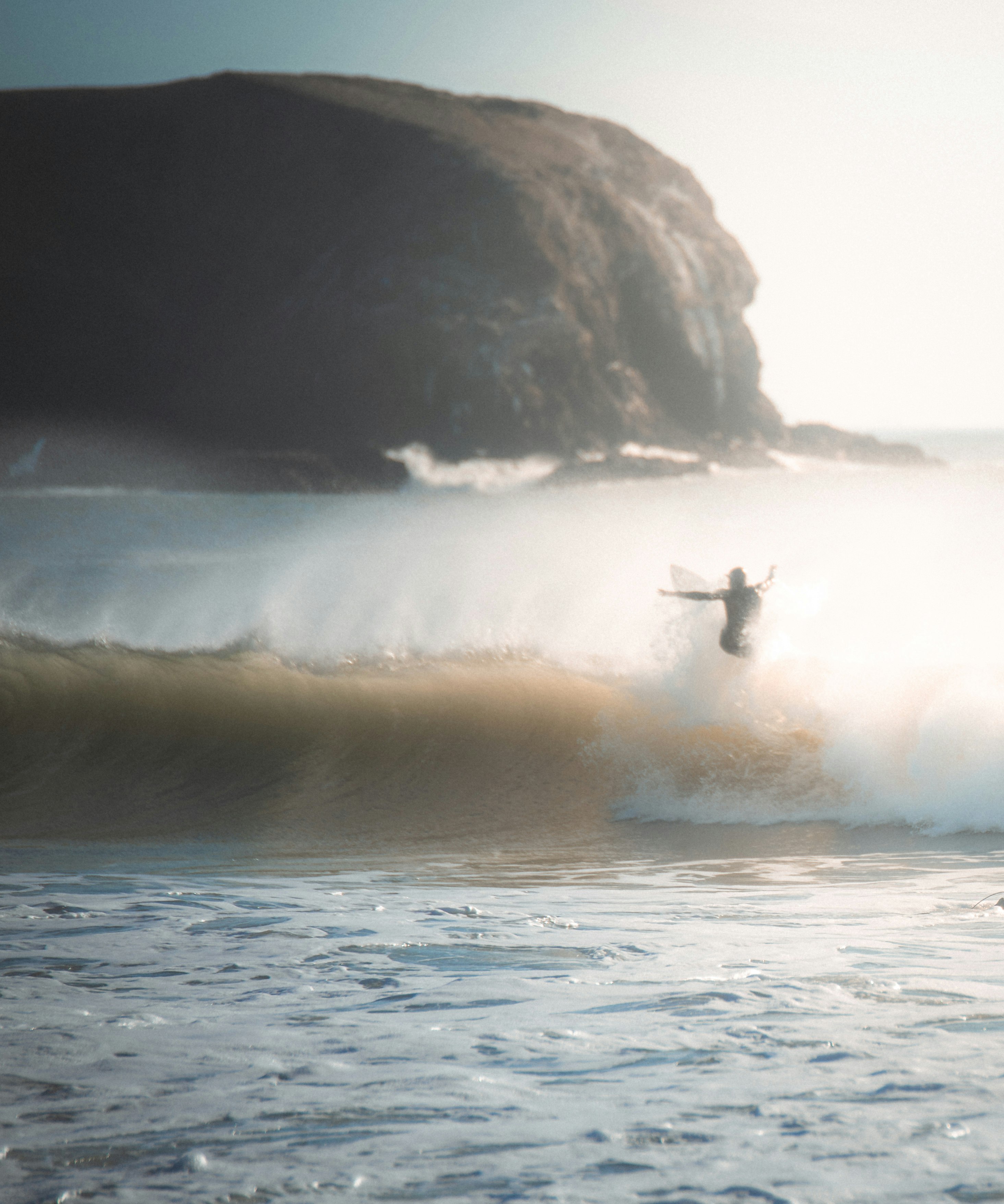 man surfing on ocean waves