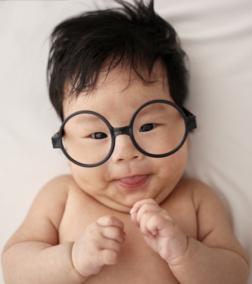 baby using white eyeglasses