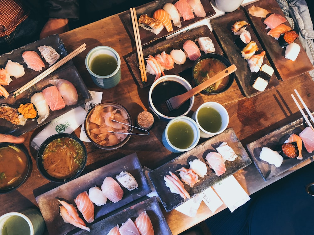 raw meats on wooden table